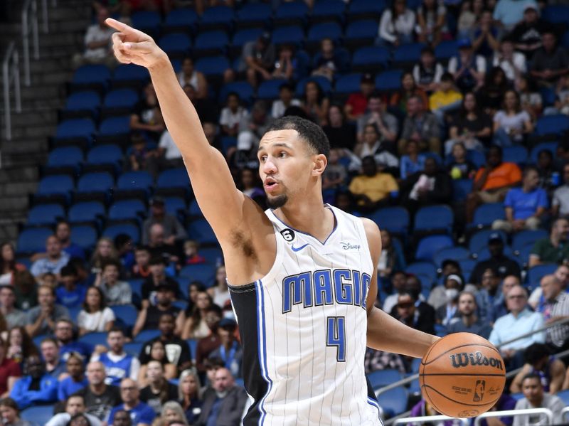 ORLANDO, FL -NOVEMBER 5: Jalen Suggs #4 of the Orlando Magic handles the ball during the game against the Sacramento Kings on November 5, 2022 at Amway Center in Orlando, Florida. NOTE TO USER: User expressly acknowledges and agrees that, by downloading and or using this photograph, User is consenting to the terms and conditions of the Getty Images License Agreement. Mandatory Copyright Notice: Copyright 2022 NBAE (Photo by Fernando Medina/NBAE via Getty Images)