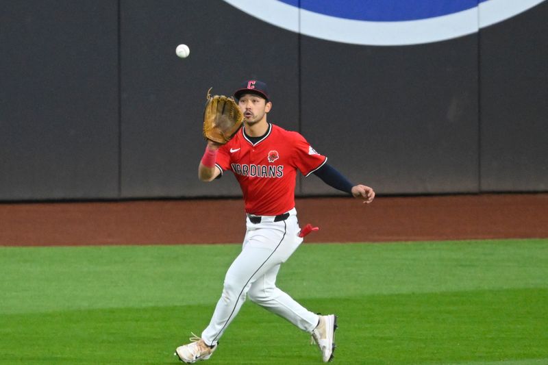May 26, 2025; Cleveland, Ohio, USA; Cleveland Guardians left fielder Steven Kwan (38) catches a fly ball in the eighth inning against the Los Angeles Dodgers at Progressive Field. Mandatory Credit: David Richard-Imagn Images