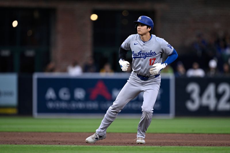 May 11, 2024; San Diego, California, USA; Los Angeles Dodgers designated hitter Shohei Ohtani (17) leads off second base during the sixth inning against the San Diego Padres at Petco Park. Mandatory Credit: Orlando Ramirez-USA TODAY Sports