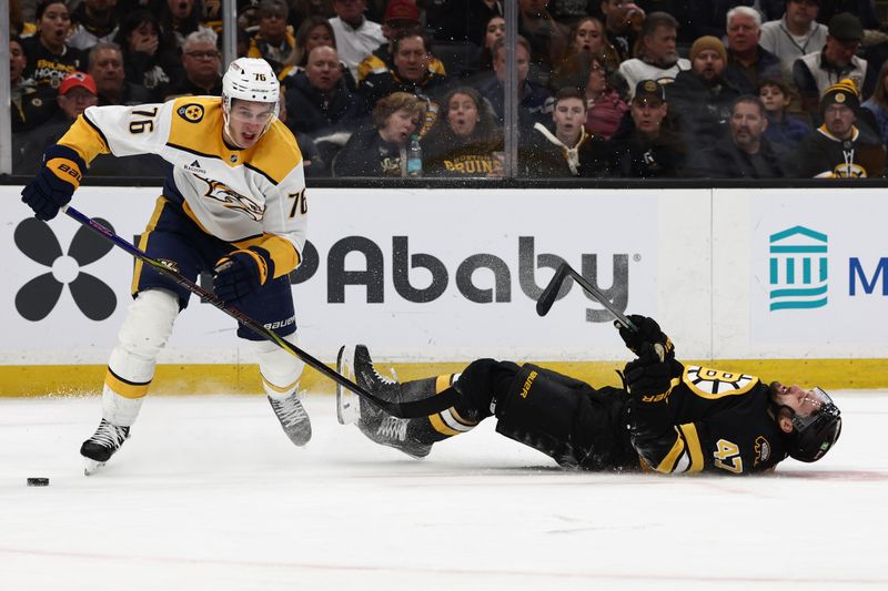 Jan 27, 2026; Boston, Massachusetts, USA; Nashville Predators defenseman Brady Skjei (76) knocks down Boston Bruins center Mark Kastelic (47) during the first period at TD Garden. Mandatory Credit: Winslow Townson-Imagn Images