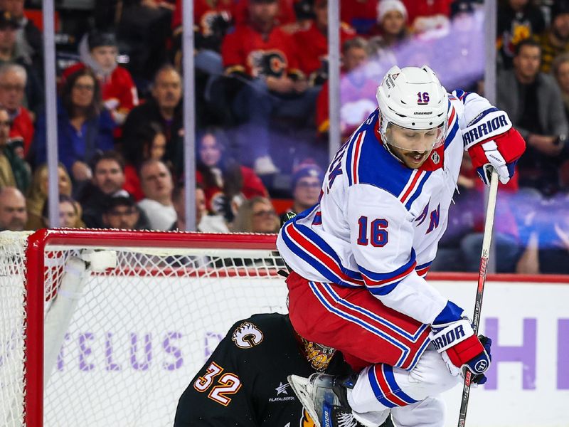 Nov 21, 2024; Calgary, Alberta, CAN; New York Rangers center Vincent Trocheck (16) screens in front of Calgary Flames goaltender Dustin Wolf (32) during the third period at Scotiabank Saddledome. Mandatory Credit: Sergei Belski-Imagn Images