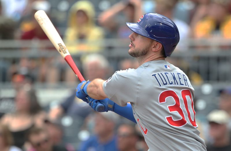 May 1, 2025; Pittsburgh, Pennsylvania, USA;  Chicago Cubs right fielder Kyle Tucker (30) hits a solo home run against the Pittsburgh Pirates during the fifth inning at PNC Park. Mandatory Credit: Charles LeClaire-Imagn Images