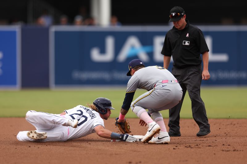 May 11, 2025; Tampa, Florida, USA; Tampa Bay Rays right fielder Travis Jankowski (20) slides into second base after hitting a double against the Milwaukee Brewers in the fifth inning  at George M. Steinbrenner Field. Mandatory Credit: Nathan Ray Seebeck-Imagn Images