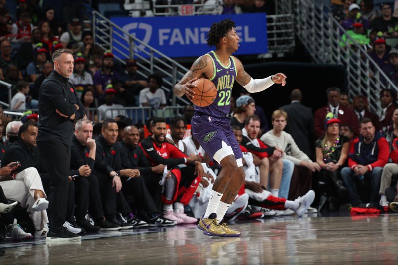 NEW ORLEANS, LA - NOVEMBER 27:  Elfrid Payton #22 of the New Orleans Pelicans dribbles the ball during the game against the Toronto Raptors during a regular season game on November 27, 2024 at the Smoothie King Center in New Orleans, Louisiana. NOTE TO USER: User expressly acknowledges and agrees that, by downloading and or using this Photograph, user is consenting to the terms and conditions of the Getty Images License Agreement. Mandatory Copyright Notice: Copyright 2024 NBAE (Photo by Layne Murdoch Jr./NBAE via Getty Images)