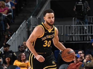 SAN FRANCISCO, CA - DECEMBER 16: Stephen Curry #30 of the Golden State Warriors dribbles the ball during the game against the Brooklyn Nets on December 16, 2023 at Chase Center in San Francisco, California. NOTE TO USER: User expressly acknowledges and agrees that, by downloading and or using this photograph, user is consenting to the terms and conditions of Getty Images License Agreement. Mandatory Copyright Notice: Copyright 2023 NBAE (Photo by Noah Graham/NBAE via Getty Images)