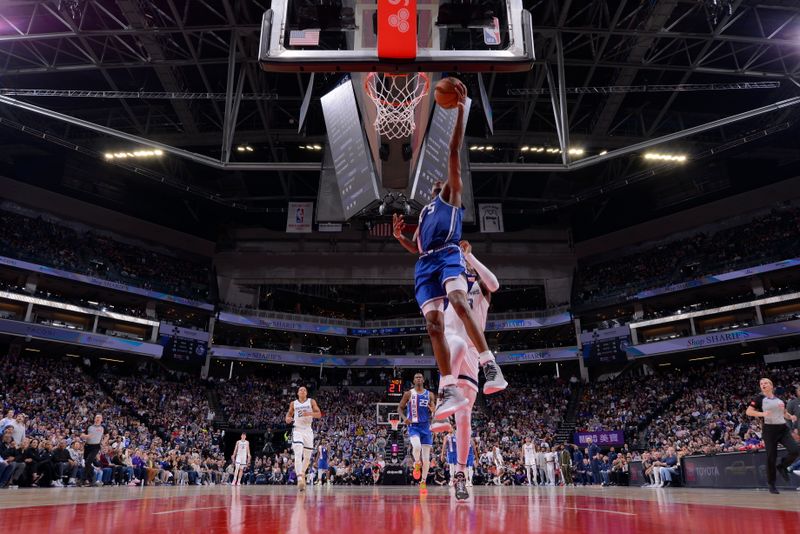 SACRAMENTO, CA - MARCH 18: De'Aaron Fox #5 of the Sacramento Kings drives to the basket during the game against the Memphis Grizzlies on March 18, 2024 at Golden 1 Center in Sacramento, California. NOTE TO USER: User expressly acknowledges and agrees that, by downloading and or using this Photograph, user is consenting to the terms and conditions of the Getty Images License Agreement. Mandatory Copyright Notice: Copyright 2024 NBAE (Photo by Rocky Widner/NBAE via Getty Images)