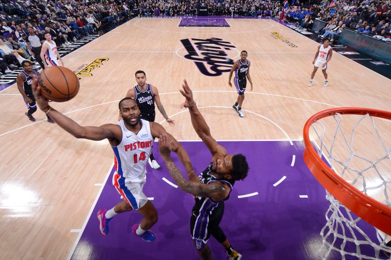 SACRAMENTO, CA - FEBRUARY 7: Alec Burks #14 of the Detroit Pistons drives to the basket during the game against the Sacramento Kings on February 7, 2024 at Golden 1 Center in Sacramento, California. NOTE TO USER: User expressly acknowledges and agrees that, by downloading and or using this Photograph, user is consenting to the terms and conditions of the Getty Images License Agreement. Mandatory Copyright Notice: Copyright 2024 NBAE (Photo by Rocky Widner/NBAE via Getty Images)