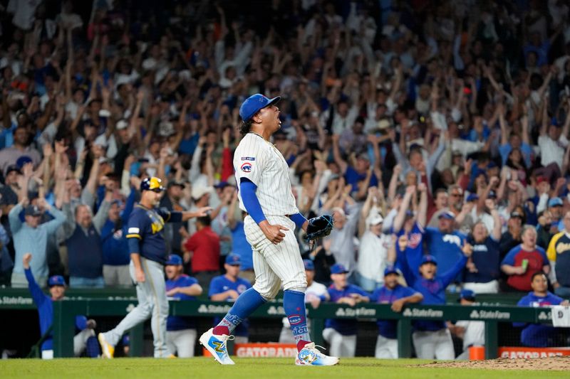 Aug 20, 2025; Chicago, Illinois, USA; Chicago Cubs pitcher Daniel Palencia (48) reacts after getting the final out against the Milwaukee Brewers during the ninth inning at Wrigley Field. Mandatory Credit: David Banks-Imagn Images