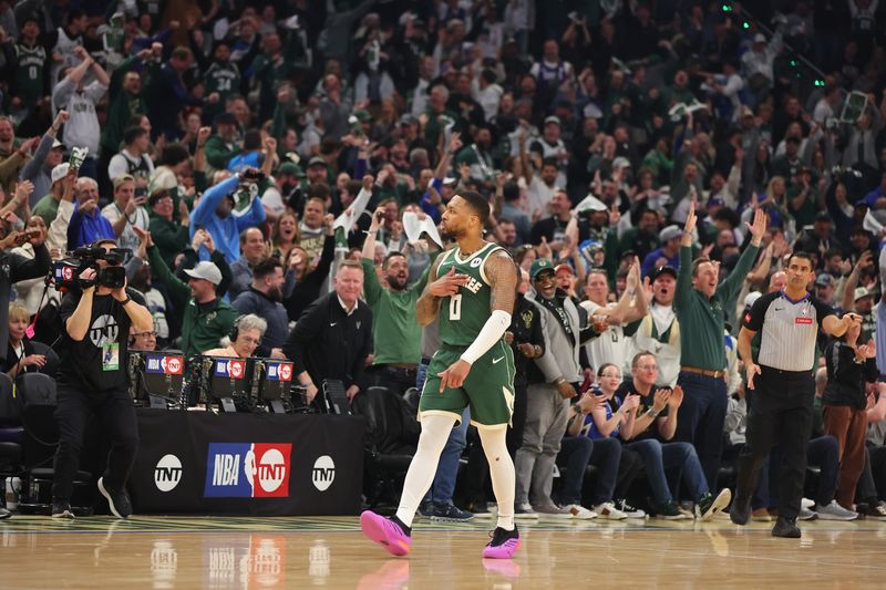 MILWAUKEE, WISCONSIN - APRIL 21: Damian Lillard #0 of the Milwaukee Bucks reacts to a three point shot during the first half of game one of the Eastern Conference First Round Playoffs against the Indiana Pacers at Fiserv Forum on April 21, 2024 in Milwaukee, Wisconsin.  NOTE TO USER: User expressly acknowledges and agrees that, by downloading and or using this photograph, User is consenting to the terms and conditions of the Getty Images License Agreement. (Photo by Stacy Revere/Getty Images)