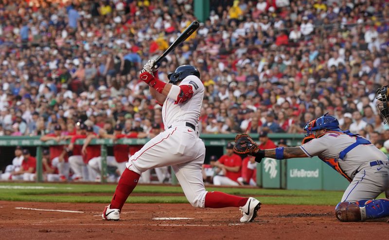 Jul 23, 2023; Boston, Massachusetts, USA; Boston Red Sox center fielder Adam Duvall (18) gets a base hit to drive in a run against the New York Mets in the first inning at Fenway Park. Mandatory Credit: David Butler II-USA TODAY Sports