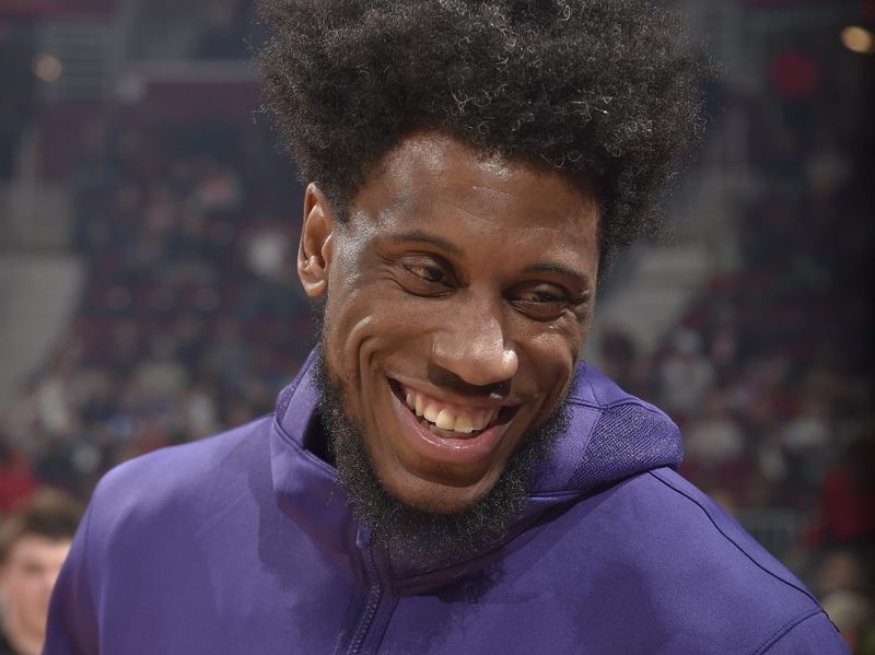 CLEVELAND, OH - MARCH 11: Thaddeus Young #30 of the Phoenix Suns smiles before the game against the Cleveland Cavaliers on March 11, 2024 at Rocket Mortgage FieldHouse in Cleveland, Ohio. NOTE TO USER: User expressly acknowledges and agrees that, by downloading and/or using this Photograph, user is consenting to the terms and conditions of the Getty Images License Agreement. Mandatory Copyright Notice: Copyright 2024 NBAE (Photo by David Liam Kyle/NBAE via Getty Images)