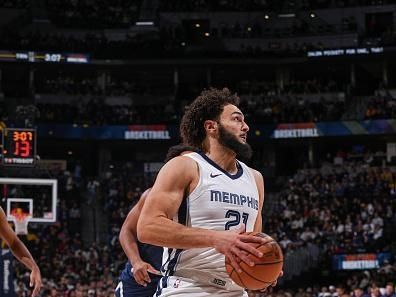 DENVER, CO - DECEMBER 28: David Roddy #21 of the Memphis Grizzlies goes to the basket during the game  on December 28, 2023 at the Ball Arena in Denver, Colorado. NOTE TO USER: User expressly acknowledges and agrees that, by downloading and/or using this Photograph, user is consenting to the terms and conditions of the Getty Images License Agreement. Mandatory Copyright Notice: Copyright 2023 NBAE (Photo by Bart Young/NBAE via Getty Images)