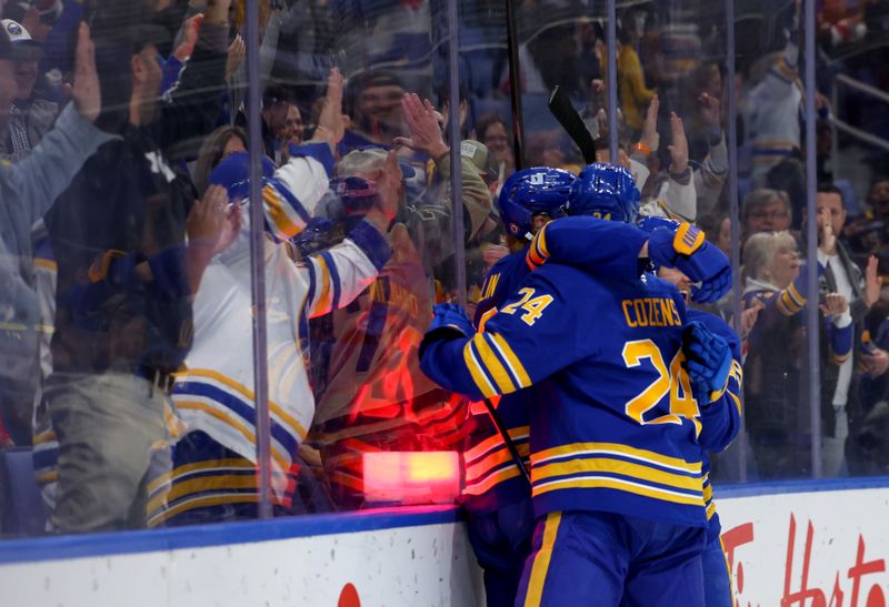 Oct 28, 2024; Buffalo, New York, USA;  Buffalo Sabres defenseman Rasmus Dahlin (26) celebrates his goal with teammates during the second period against the Florida Panthers at KeyBank Center. Mandatory Credit: Timothy T. Ludwig-Imagn Images