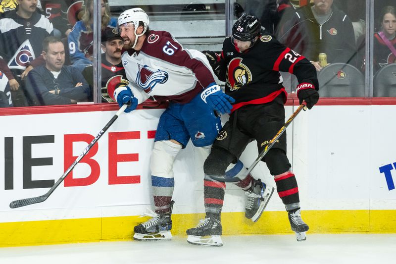 Mar 20, 2025; Ottawa, Ontario, CAN; Colorado Avalanche defenseman Keaton Middleton (67) is checked by Ottawa Senators center Dylan Cozens (24) in the third period at the Canadian Tire Centre. Mandatory Credit: Marc DesRosiers-Imagn Images