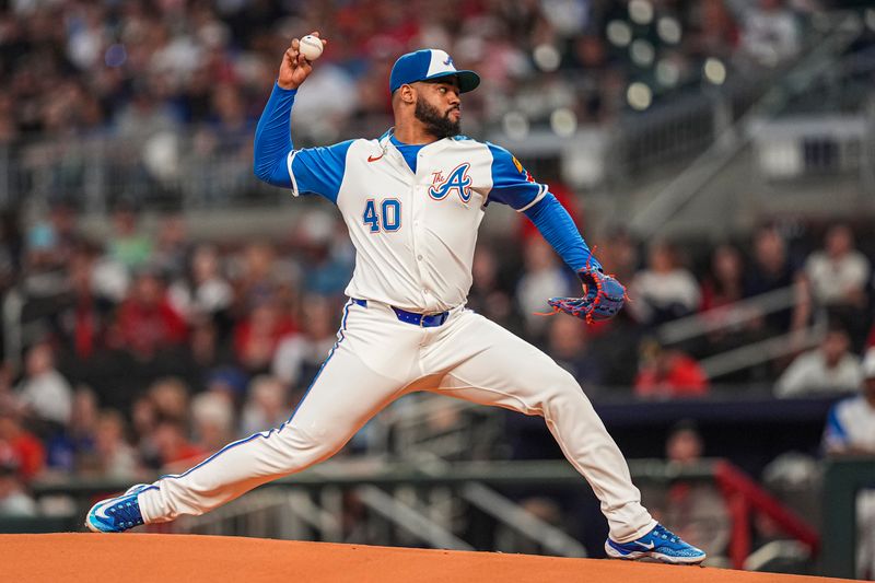 Sep 28, 2024; Cumberland, Georgia, USA; Atlanta Braves pitcher Reynaldo Lopez (40) pitches against the Kansas City Royals during the first inning at Truist Park. Mandatory Credit: Dale Zanine-Imagn Images