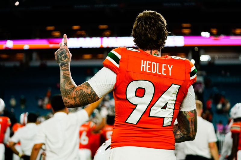 Oct 8, 2022; Miami Gardens, Florida, USA; Miami Hurricanes punter Lou Hedley (94) signals to the crowd after the game against the North Carolina Tar Heels at Hard Rock Stadium. Mandatory Credit: Rich Storry-USA TODAY Sports