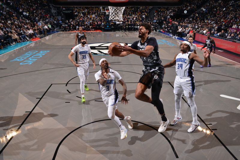 BROOKLYN, NY - DECEMBER 1: Cameron Johnson #2 of the Brooklyn Nets drives to the basket during the game against the Orlando Magic on December 1, 2024 at Barclays Center in Brooklyn, New York. NOTE TO USER: User expressly acknowledges and agrees that, by downloading and or using this Photograph, user is consenting to the terms and conditions of the Getty Images License Agreement. Mandatory Copyright Notice: Copyright 2024 NBAE (Photo by Jesse D. Garrabrant/NBAE via Getty Images)