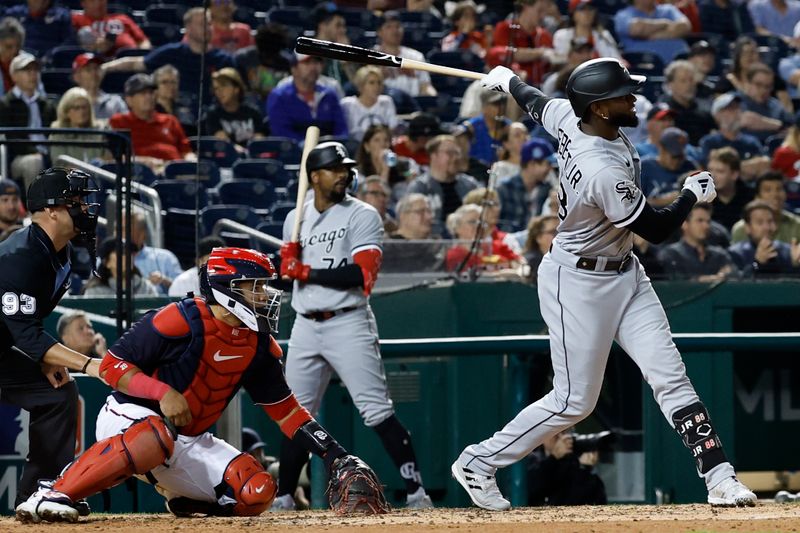 Sep 18, 2023; Washington, District of Columbia, USA; Chicago White Sox center fielder Luis Robert Jr. (88) hits a three run home run against the Washington Nationals during the fifth inning at Nationals Park. Mandatory Credit: Geoff Burke-USA TODAY Sports