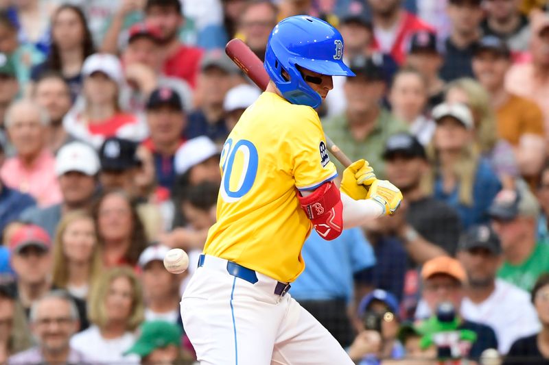 Jun 28, 2025; Boston, Massachusetts, USA; Boston Red Sox second baseman Nick Sogard (20) gets hit by a pitch during the first inning against the Toronto Blue Jays at Fenway Park. Mandatory Credit: Bob DeChiara-Imagn Images