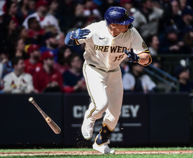 Apr 17, 2022; Milwaukee, Wisconsin, USA;  Milwaukee Brewers center fielder Tyrone Taylor (15) hits a double to drive in 2 runs in the seventh inning  against the St. Louis Cardinals at American Family Field. Mandatory Credit: Benny Sieu-USA TODAY Sports