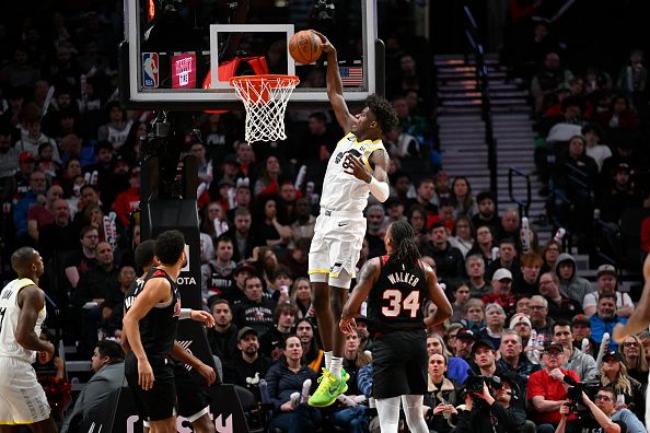 PORTLAND, OREGON - DECEMBER 14: Taylor Hendricks #0 of the Utah Jazz dunks during the third quarter of the game \H at Moda Center on December 14, 2023 in Portland, Oregon. The Utah Jazz won 122-114. NOTE TO USER: User expressly acknowledges and agrees that, by downloading and or using this Photograph, user is consenting to the terms and conditions of the Getty Images License Agreement. (Photo by Alika Jenner/Getty Images)