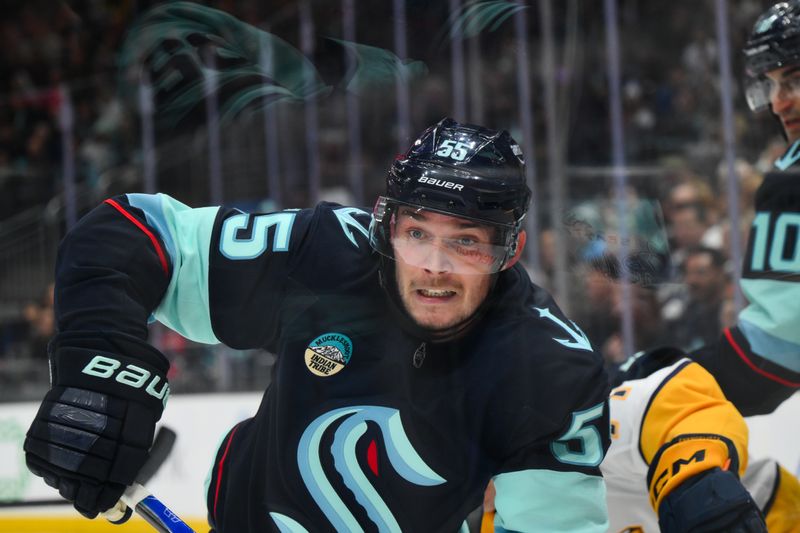 Jan 1, 2026; Seattle, Washington, USA; Seattle Kraken defenseman Ryan Lindgren (55) during the third period against the Nashville Predators at Climate Pledge Arena. Mandatory Credit: Steven Bisig-Imagn Images