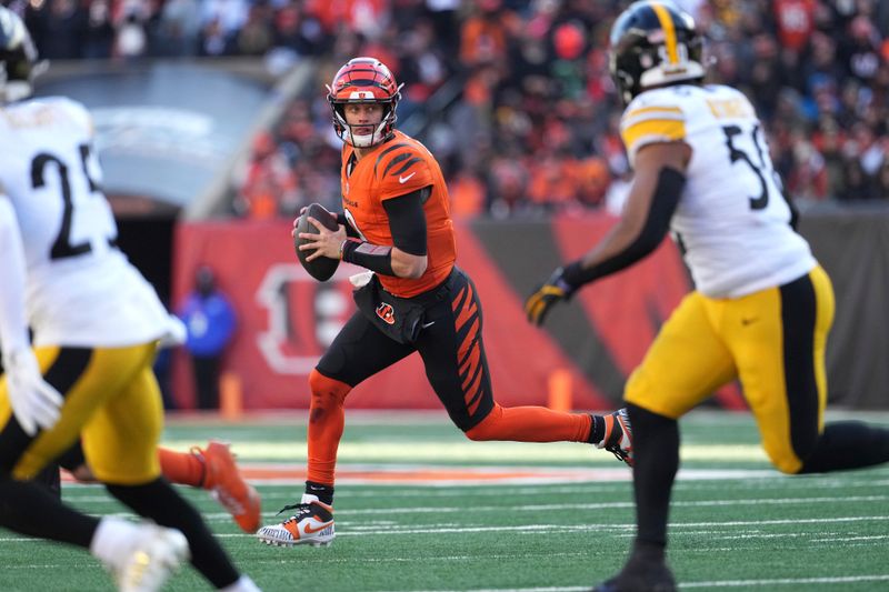 Cincinnati Bengals quarterback Joe Burrow looks to throw during the first half of an NFL football game against the Pittsburgh Steelers, Sunday, Dec. 1, 2024, in Cincinnati. (AP Photo/Kareem Elgazzar)