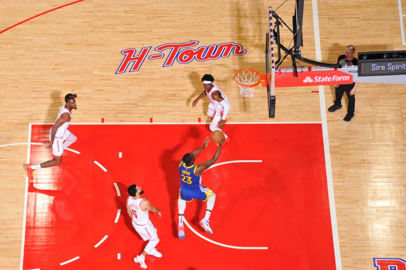 HOUSTON, TX - APRIL 4: Draymond Green #23 of the Golden State Warriors drives to the basket during the game against the Houston Rockets on April 4, 2024 at the Toyota Center in Houston, Texas. NOTE TO USER: User expressly acknowledges and agrees that, by downloading and or using this photograph, User is consenting to the terms and conditions of the Getty Images License Agreement. Mandatory Copyright Notice: Copyright 2024 NBAE (Photo by Logan Riely/NBAE via Getty Images)