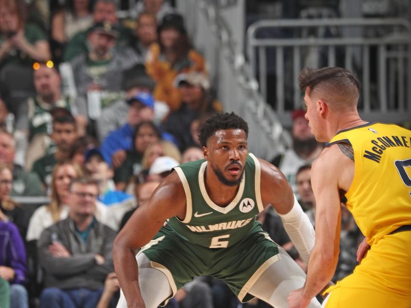 MILWAUKEE, WI - APRIL 21: Malik Beasley #5 of the Milwaukee Bucks plays defense during the game against the Indiana Pacers during Round 1 Game 1 of the 2024 NBA Playoffs on April 21, 2024 at the Fiserv Forum Center in Milwaukee, Wisconsin. NOTE TO USER: User expressly acknowledges and agrees that, by downloading and or using this Photograph, user is consenting to the terms and conditions of the Getty Images License Agreement. Mandatory Copyright Notice: Copyright 2024 NBAE (Photo by Gary Dineen/NBAE via Getty Images).