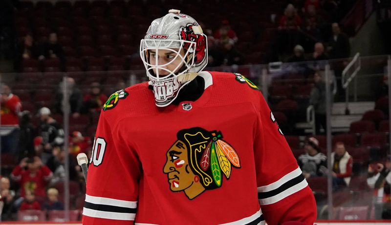 Jan 22, 2023; Chicago, Illinois, USA; Chicago Blackhawks goaltender Jaxson Stauber (30) warms up before the game against the Los Angeles Kings at United Center. Mandatory Credit: David Banks-USA TODAY Sports