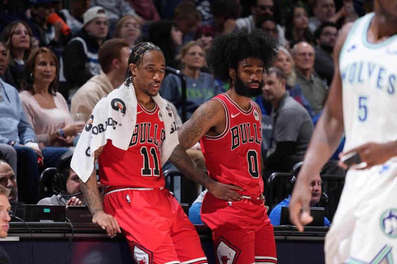 MINNEAPOLIS, MN -  MARCH 31: DeMar DeRozan #11 of the Chicago Bulls and Coby White #0 of the Chicago Bulls speak during the game against the Minnesota Timberwolves on March 31, 2024 at Target Center in Minneapolis, Minnesota. NOTE TO USER: User expressly acknowledges and agrees that, by downloading and or using this Photograph, user is consenting to the terms and conditions of the Getty Images License Agreement. Mandatory Copyright Notice: Copyright 2024 NBAE (Photo by Jordan Johnson/NBAE via Getty Images)