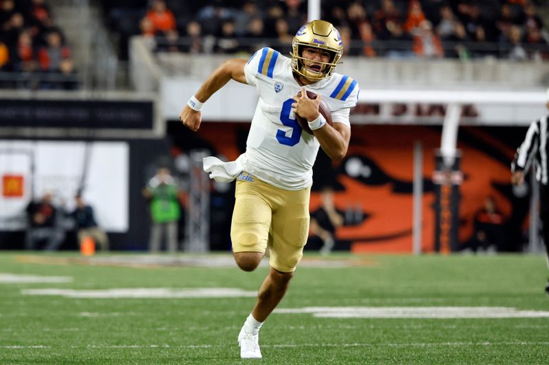 Oct 14, 2023; Corvallis, Oregon, USA; UCLA Bruins quarterback Collin Schlee (9) runs the ball  during the second half against the Oregon State Beavers at Reser Stadium. Mandatory Credit: Soobum Im-USA TODAY Sports