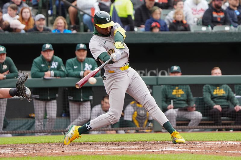 Apr 27, 2024; Baltimore, Maryland, USA; Oakland Athletics left fielder Esteury Ruiz (1) hits a single against the Baltimore Orioles during the sixth inning at Oriole Park at Camden Yards. Mandatory Credit: Gregory Fisher-USA TODAY Sports