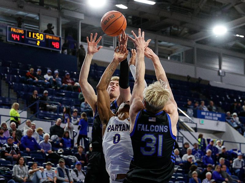 Jan 13, 2024; Colorado Springs, Colorado, USA; San Jose State Spartans guard Myron Amey Jr. (0) attempts a shot against Air Force Falcons forward Rytis Petraitis (31) as forward Luke Kearney (3) defends in the second half at Clune Arena. Mandatory Credit: Isaiah J. Downing-USA TODAY Sports