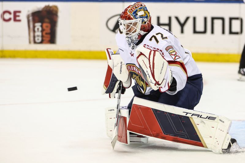 Oct 24, 2024; New York, New York, USA;  Florida Panthers goaltender Sergei Bobrovsky (72) makes a save on a shot on goal attempt in the second period against the New York Rangers at Madison Square Garden. Mandatory Credit: Wendell Cruz-Imagn Images