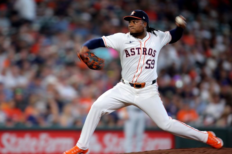 Aug 18, 2024; Houston, Texas, USA; (editors note: in camera motion blur) Houston Astros starting pitcher Framber Valdez (59) delivers a pitch against the Chicago White Sox during the fourth inning at Minute Maid Park. Mandatory Credit: Erik Williams-USA TODAY Sports