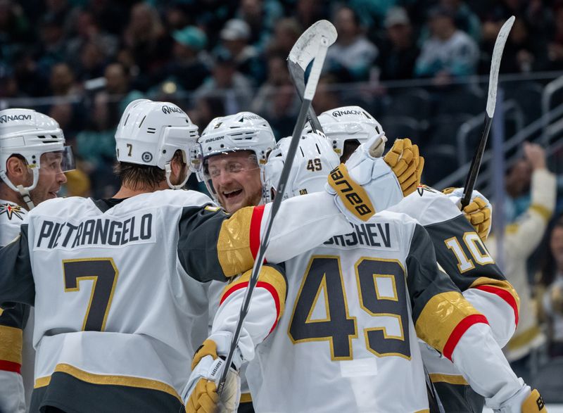 Nov 8, 2024; Seattle, Washington, USA;  Vegas Golden Knights including forward Jack Eichel (9), third from right, forward Keegan Kolesar (55), left, defenseman Alex Pietrangelo (7), forward Ivan Barbashev (49) and forward Nicolas Roy (10) celebrate a gold 1p against the Seattle Kraken at Climate Pledge Arena. Mandatory Credit: Stephen Brashear-Imagn Images