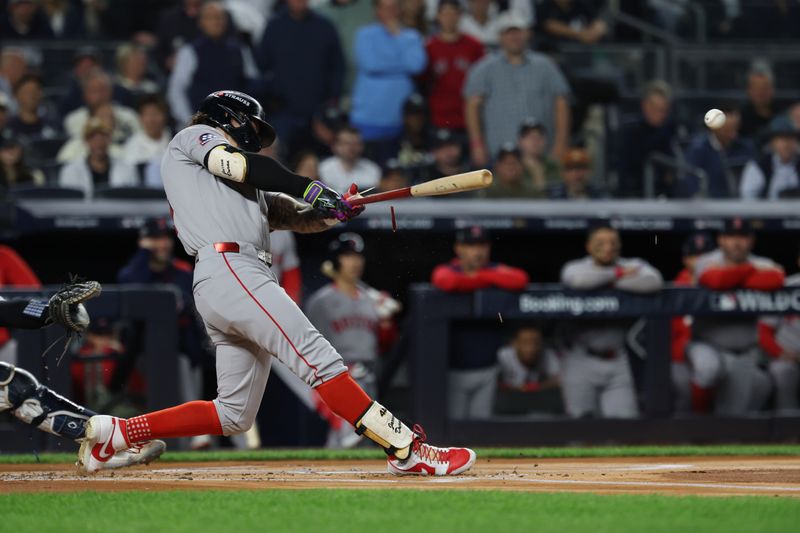 Oct 2, 2025; Bronx, New York, USA; Boston Red Sox outfielder Jarren Duran (16) breaks his bat as he lines out during the first inning against the New York Yankees during game three of the Wildcard round for the 2025 MLB playoffs at Yankee Stadium. Mandatory Credit: Vincent Carchietta-Imagn Images