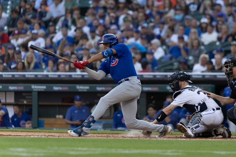 Aug 22, 2023; Detroit, Michigan, USA; Chicago Cubs second baseman Christopher Morel (5) strikes out on a check swing in the second inning against the Detroit Tigers at Comerica Park. Mandatory Credit: David Reginek-USA TODAY Sports