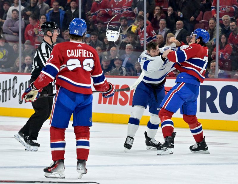 Nov 7, 2023; Montreal, Quebec, CAN; Tampa Bay Lightning forward Tanner Jeannot (84) fights Montreal Canadiens defenseman Arber Xhekaj (72) during the second period at the Bell Centre. Mandatory Credit: Eric Bolte-USA TODAY Sports