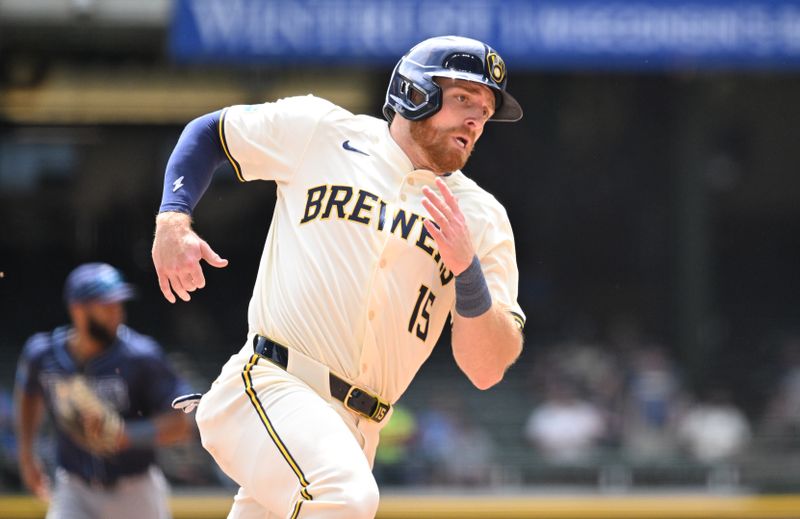 May 1, 2024; Milwaukee, Wisconsin, USA; Milwaukee Brewers third base Oliver Dunn (15) rounds second and scores against the Tampa Bay Rays in the third inning at American Family Field. Mandatory Credit: Michael McLoone-USA TODAY Sports