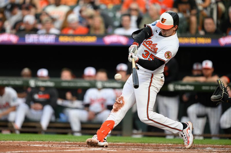 Apr 30, 2025; Baltimore, Maryland, USA; Baltimore Orioles third base coach Tony Mansolino (36) hits a home run during the second inning against the New York Yankees at Oriole Park at Camden Yards. Mandatory Credit: Reggie Hildred-Imagn Images