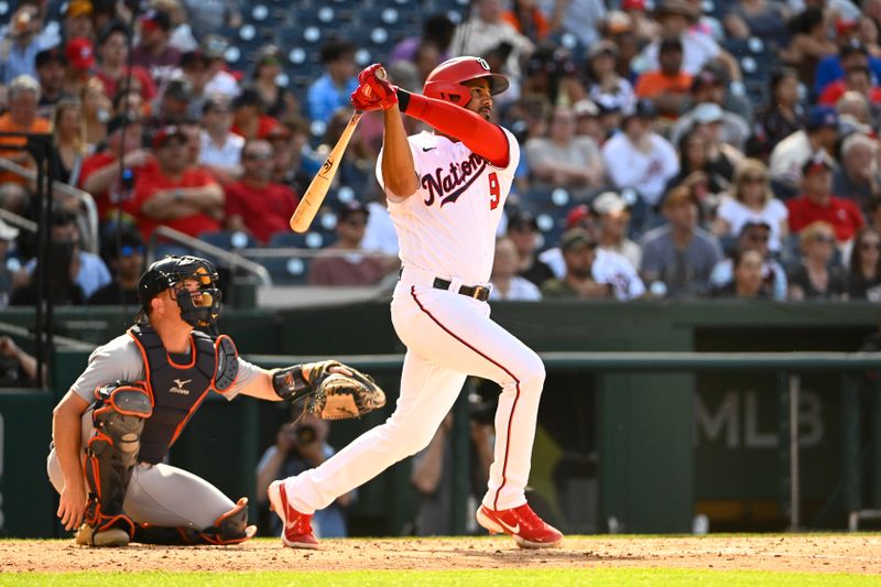 May 20, 2023; Washington, District of Columbia, USA; Washington Nationals third baseman Jeimer Candelario (9) hits a solo home run against the Detroit Tigers dfourth inning at Nationals Park. Mandatory Credit: Brad Mills-USA TODAY Sports