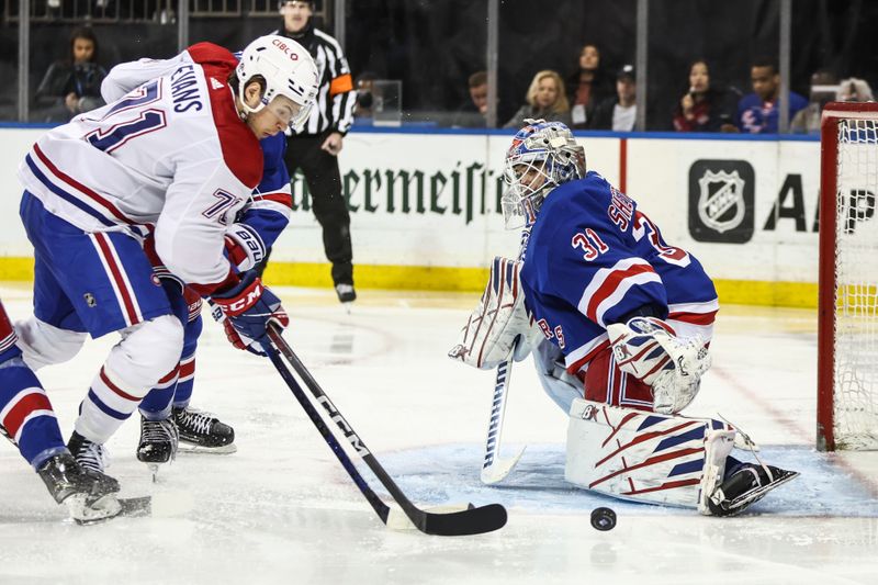 Apr 7, 2024; New York, New York, USA;  New York Rangers goaltender Igor Shesterkin (31) defends the net from a shot on goal attempt by Montreal Canadiens center Jake Evans (71) in the third period at Madison Square Garden. Mandatory Credit: Wendell Cruz-USA TODAY Sports