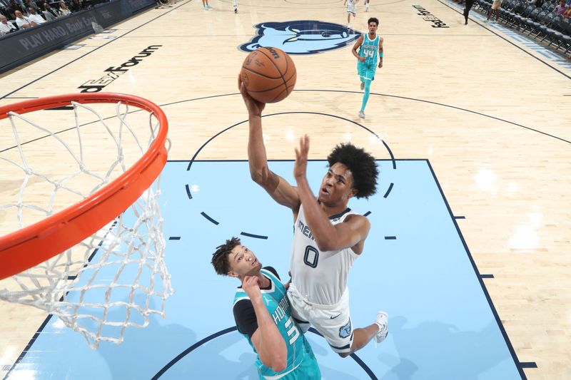 MEMPHIS, TN - OCTOBER 10: Jaylen Wells #0 of the Memphis Grizzlies dunks the ball during the game against the Charlotte Hornets during a NBA Preseason game on October 10, 2024 at FedExForum in Memphis, Tennessee. NOTE TO USER: User expressly acknowledges and agrees that, by downloading and or using this photograph, User is consenting to the terms and conditions of the Getty Images License Agreement. Mandatory Copyright Notice: Copyright 2024 NBAE (Photo by Joe Murphy/NBAE via Getty Images)