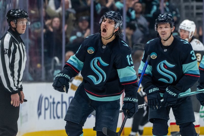 Nov 8, 2024; Seattle, Washington, USA;  Seattle Kraken forward Brandon Tanev (13) celebrates after scoring a goal during the first period against the Vegas Golden Knights at Climate Pledge Arena. Mandatory Credit: Stephen Brashear-Imagn Images