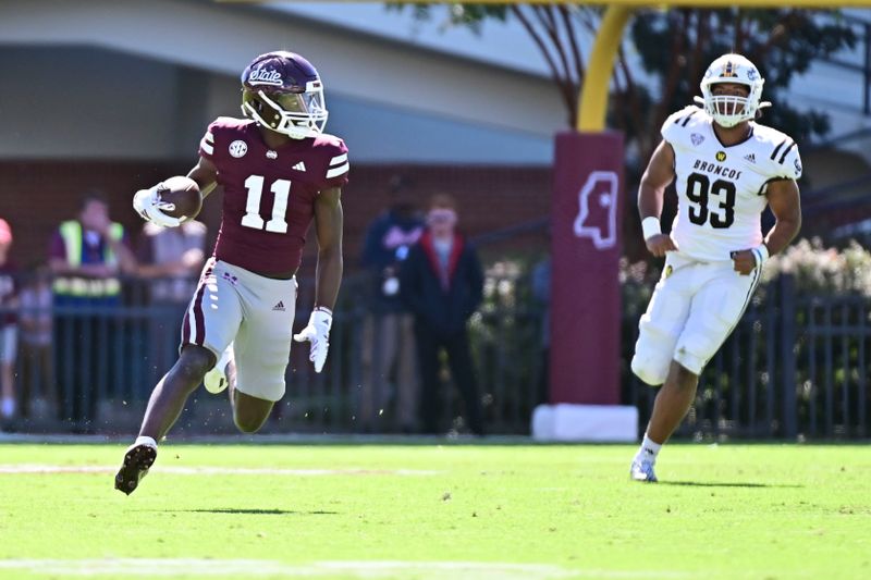 Oct 7, 2023; Starkville, Mississippi, USA; Mississippi State Bulldogs wide receiver Jaden Walley (11) runs the ball while defended by Western Michigan Broncos defensive lineman Corey Walker (93) fourth quarter at Davis Wade Stadium at Scott Field. Mandatory Credit: Matt Bush-USA TODAY Sports