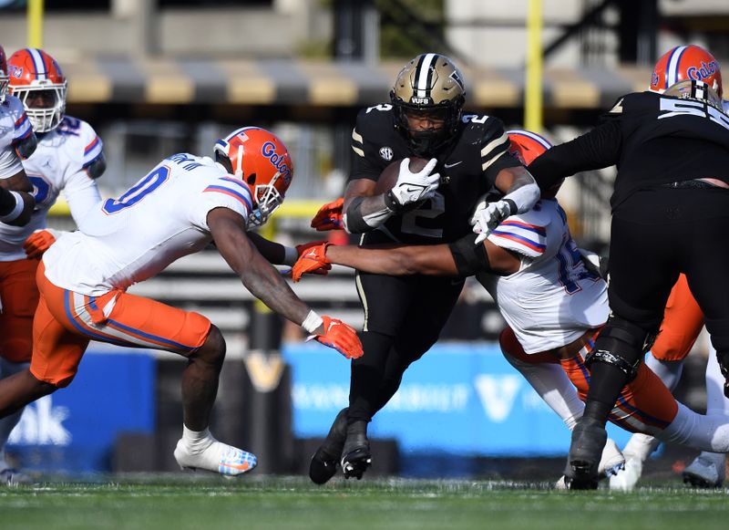 Nov 19, 2022; Nashville, Tennessee, USA; Vanderbilt Commodores running back Ray Davis (2) runs for a first down during the second half against the Florida Gators at FirstBank Stadium. Mandatory Credit: Christopher Hanewinckel-USA TODAY Sports