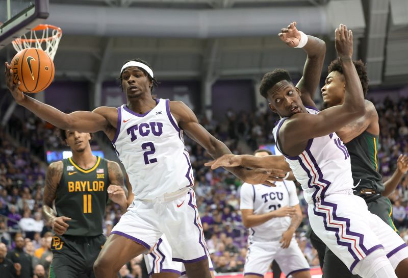 Feb 11, 2023; Fort Worth, Texas, USA;  TCU Horned Frogs forward Emanuel Miller (2) grabs the ball in front of Baylor Bears forward Jalen Bridges (11) during the second half at Ed and Rae Schollmaier Arena. Mandatory Credit: Kevin Jairaj-USA TODAY Sports