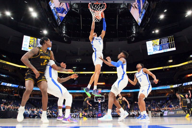 Jan 19, 2023; Memphis, Tennessee, USA; Memphis Tigers forward Kaodirichi Akobundu-Ehiogu (5) collects a rebound during the first half against the Wichita State Shockers at FedExForum. Mandatory Credit: Petre Thomas-USA TODAY Sports